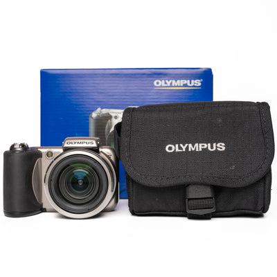Olympus SP-600UZ 12.0MP Gold/Black Digital Camera - NEW