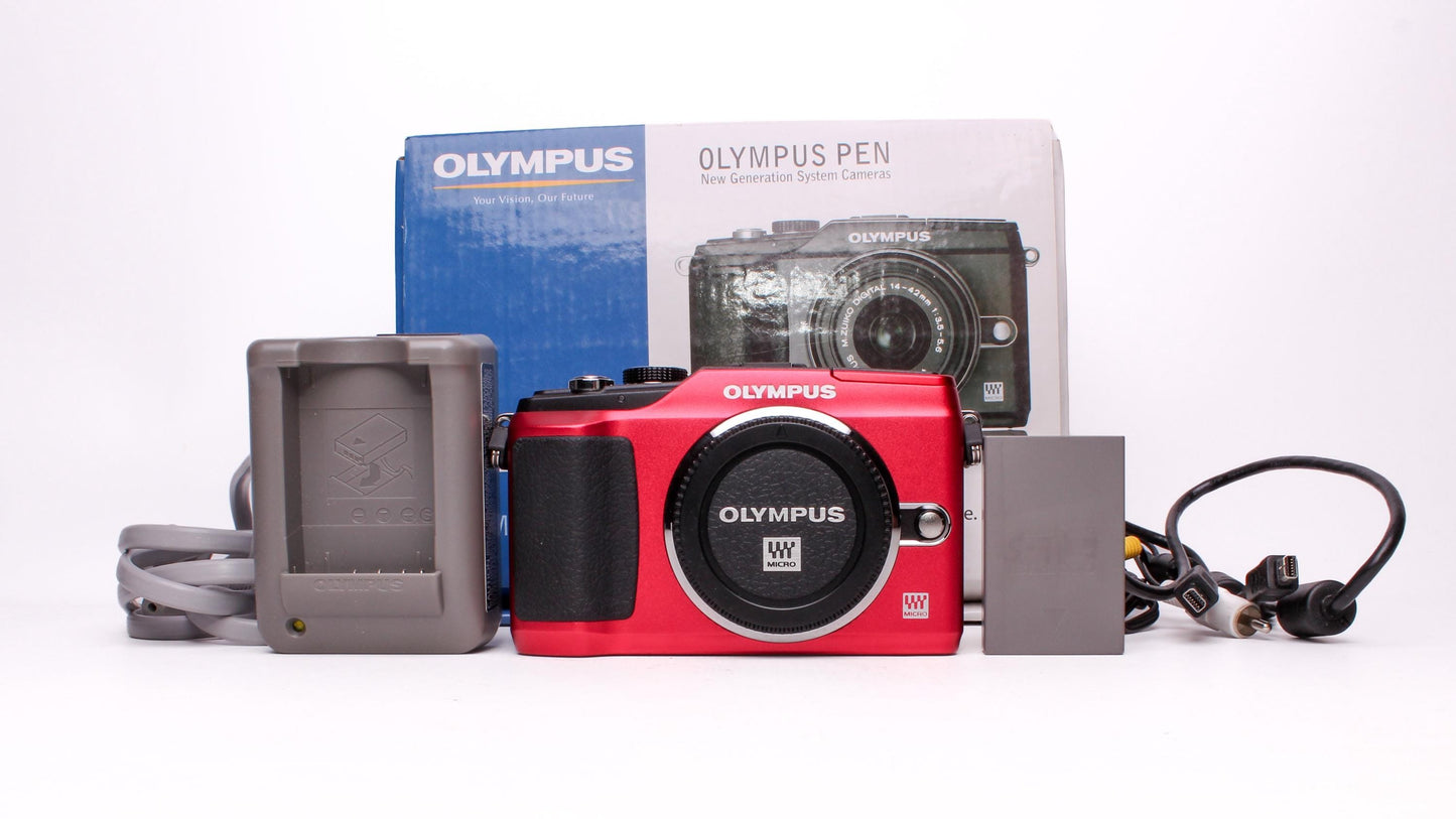 Olympus pen e-pl2 12.3mp digital camera shutter count only 558!