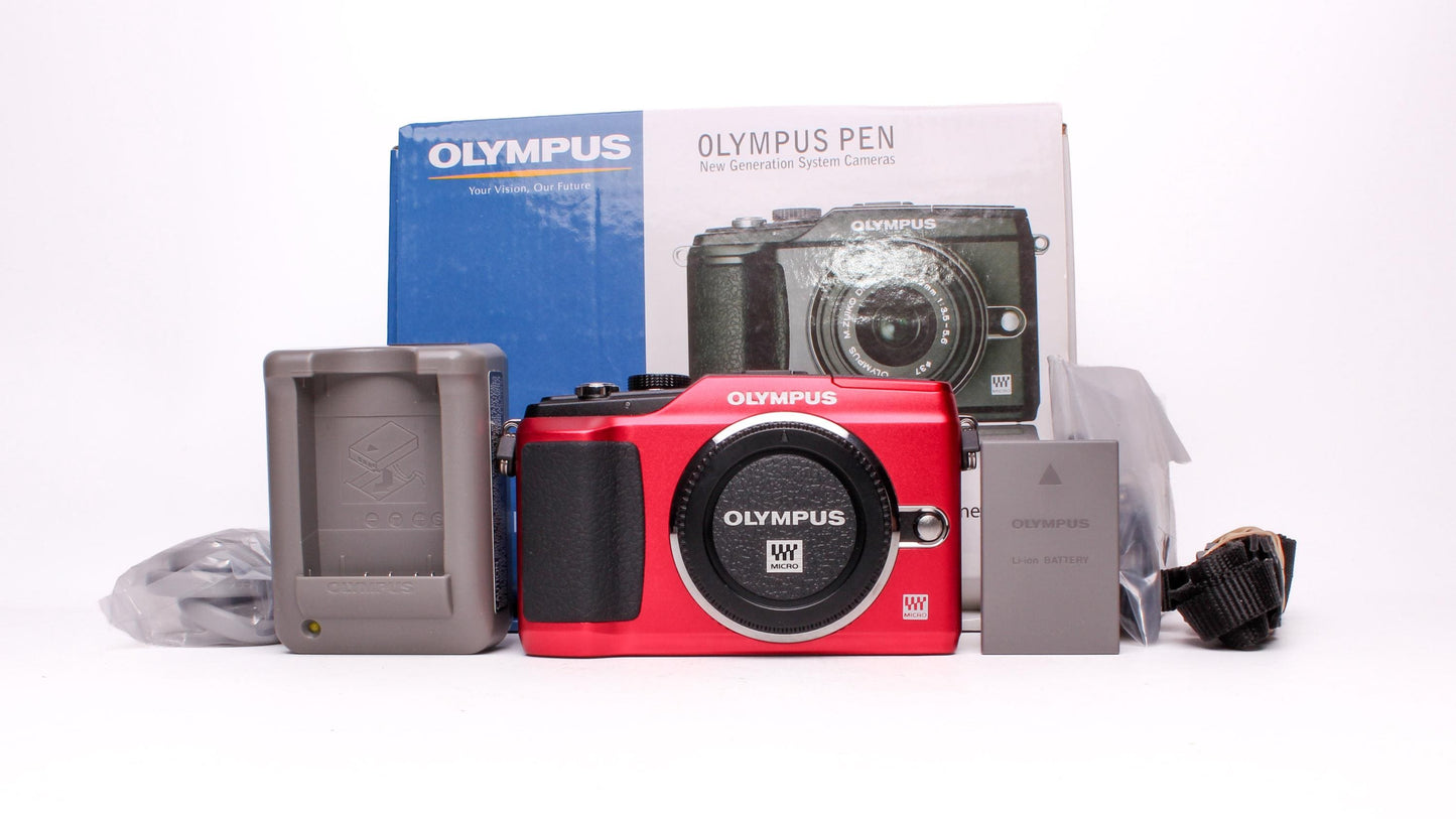 Olympus pen e-pl2 12.3mp digital camera shutter count only 2084!