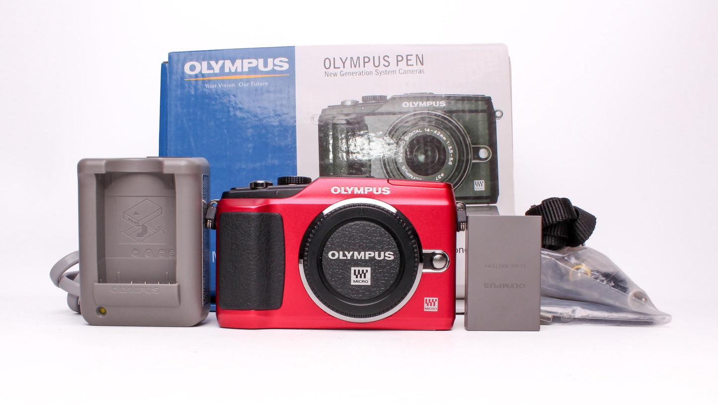 Olympus pen e-pl2 12.3mp digital camera shutter count only 875!